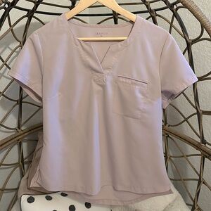 Good condition used scrub top Jaanuu - M